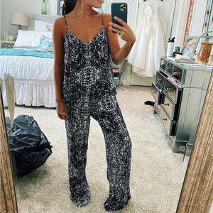 Black and white printed jumpsuit. Size small. Never worn. $65